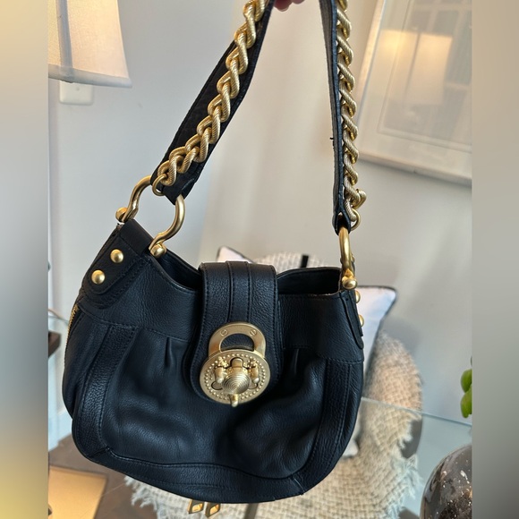 Soft black leather bag, chunky gold turnlock hardware. - Picture 2 of 3